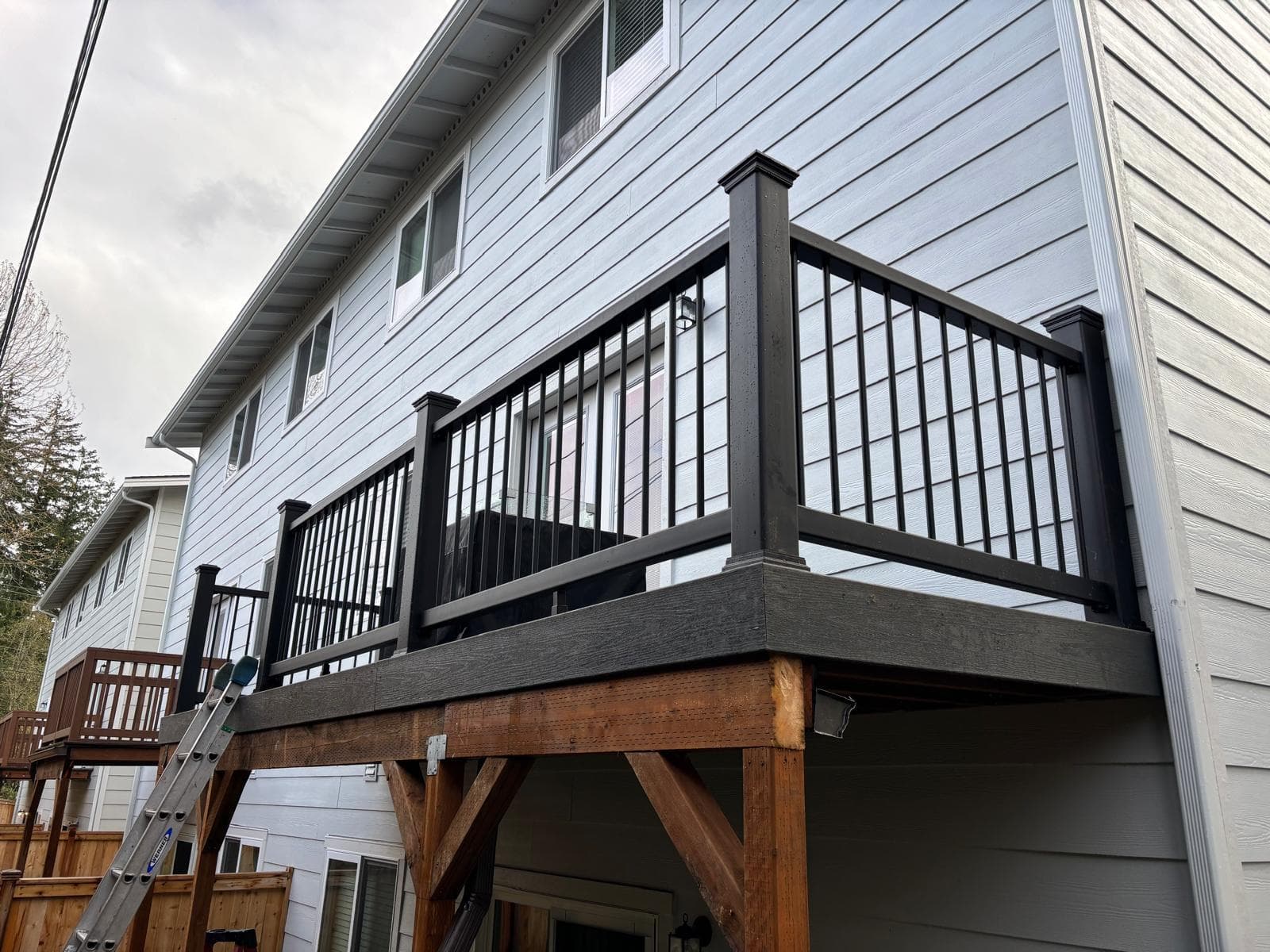 Decking — elevated deck with black aluminum railing