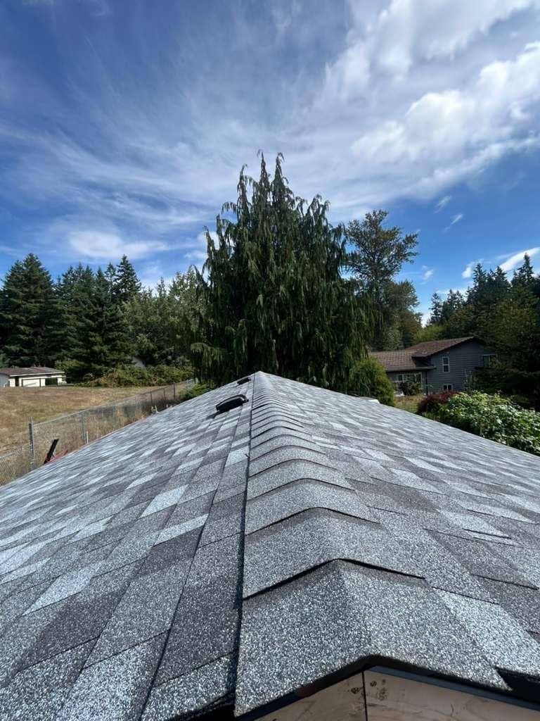 Completed architectural shingle roof by Overstate in Connecticut